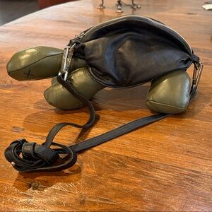 Christopher Raeburn Black LeatherTurtle Bag with silver tone hardware